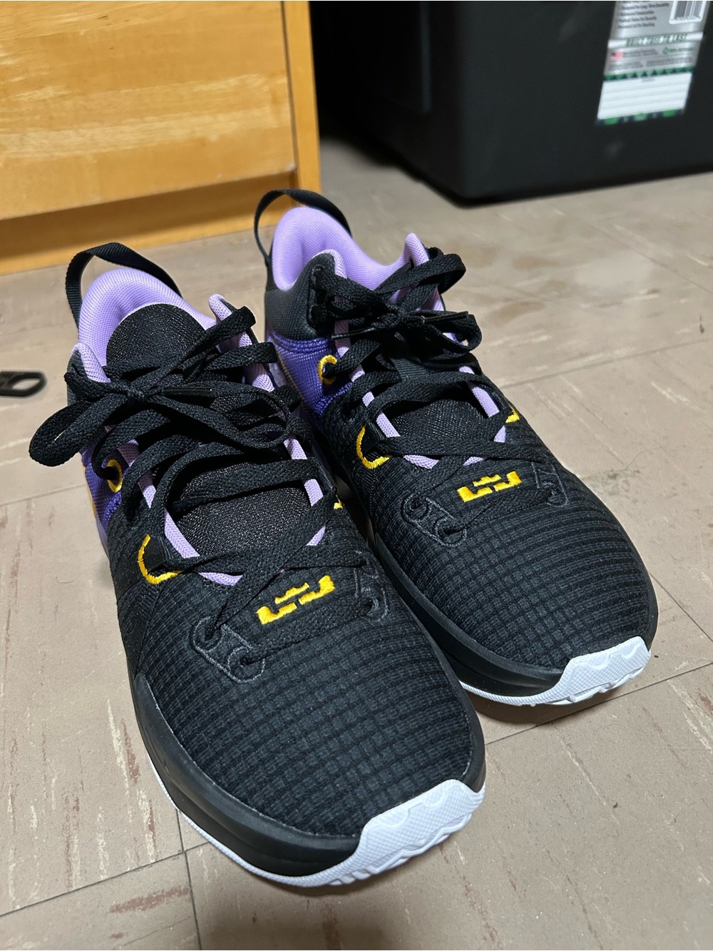 Nike SZ 8.5 Men's LeBron
Witness 7 black, lilac, and gold basketball shoes
